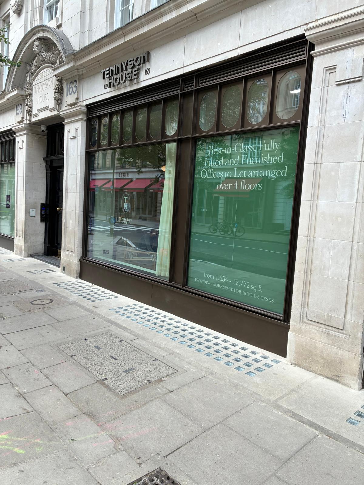 Bronze-framed aluminium shopfront at Tennyson House, 163 Great Portland Street, London